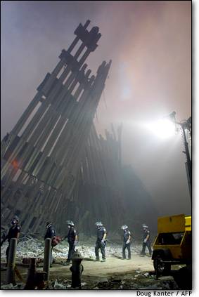 The World Trade Center in ruins as firefighters go about their search